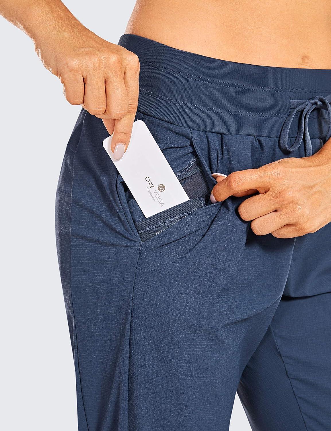 imageCRZ YOGA Athletic Joggers for Women 275quot Lightweight Travel Outdoor Hiking Pants with PocketsNubei Blue