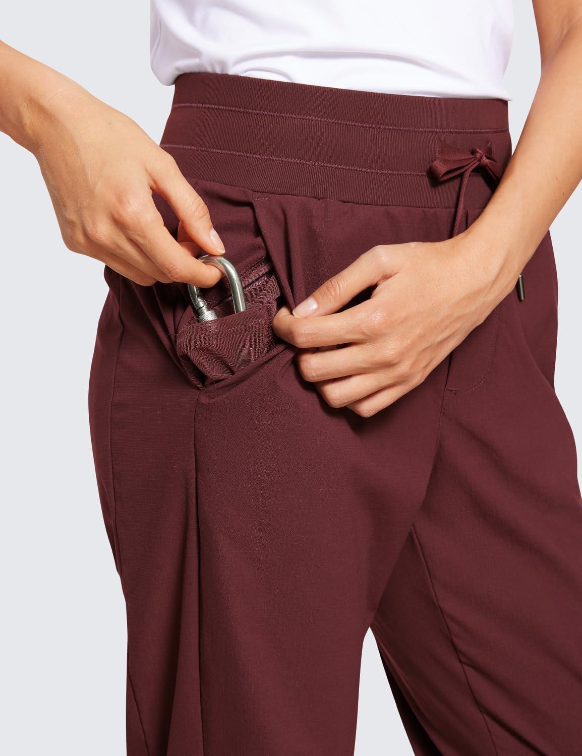 imageCRZ YOGA Athletic Joggers for Women 275quot Lightweight Travel Outdoor Hiking Pants with PocketsRed Merlot