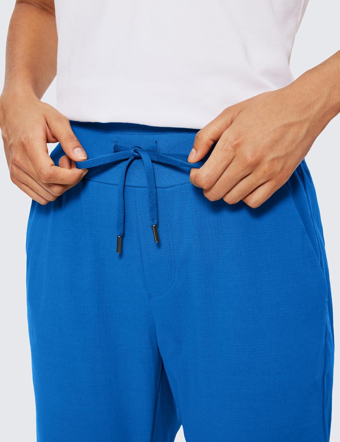 imageCRZ YOGA Athletic Joggers for Women 275quot Lightweight Travel Outdoor Hiking Pants with PocketsSparkle Blue