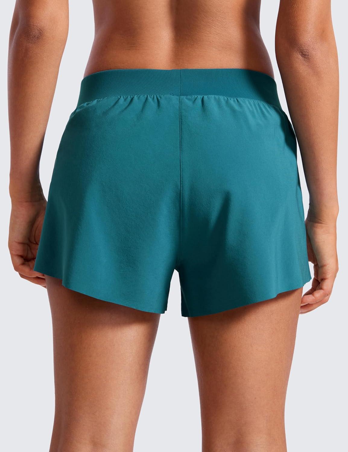 imageCRZ YOGA Athletic Running Shorts for Women V Split Low Waisted Lightweight Gym Workout Athletic Shorts with LinerBorealis Green