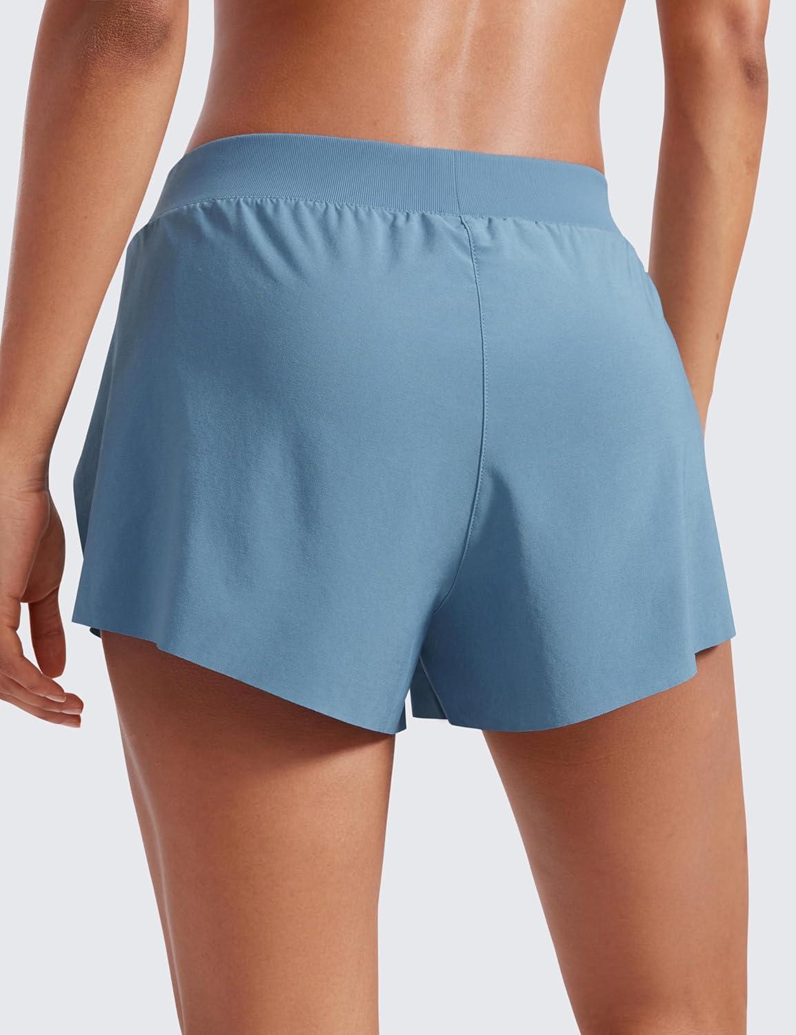 imageCRZ YOGA Athletic Running Shorts for Women V Split Low Waisted Lightweight Gym Workout Athletic Shorts with LinerUniverse Blue