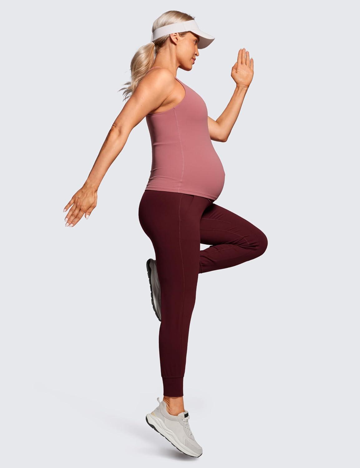 imageCRZ YOGA Butterluxe Maternity Joggers Pockets 27quot Workout Active Yoga Pregnancy Womens Pants Over The Belly SoftRed Merlot