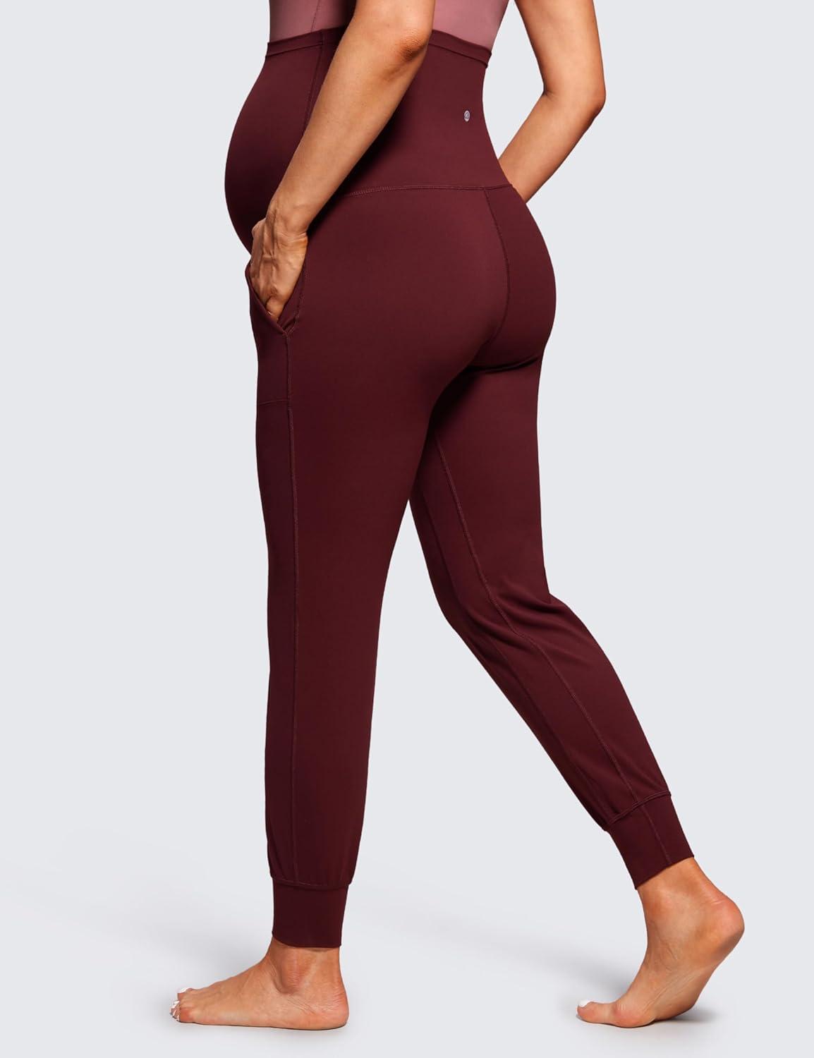 imageCRZ YOGA Butterluxe Maternity Joggers Pockets 27quot Workout Active Yoga Pregnancy Womens Pants Over The Belly SoftRed Merlot