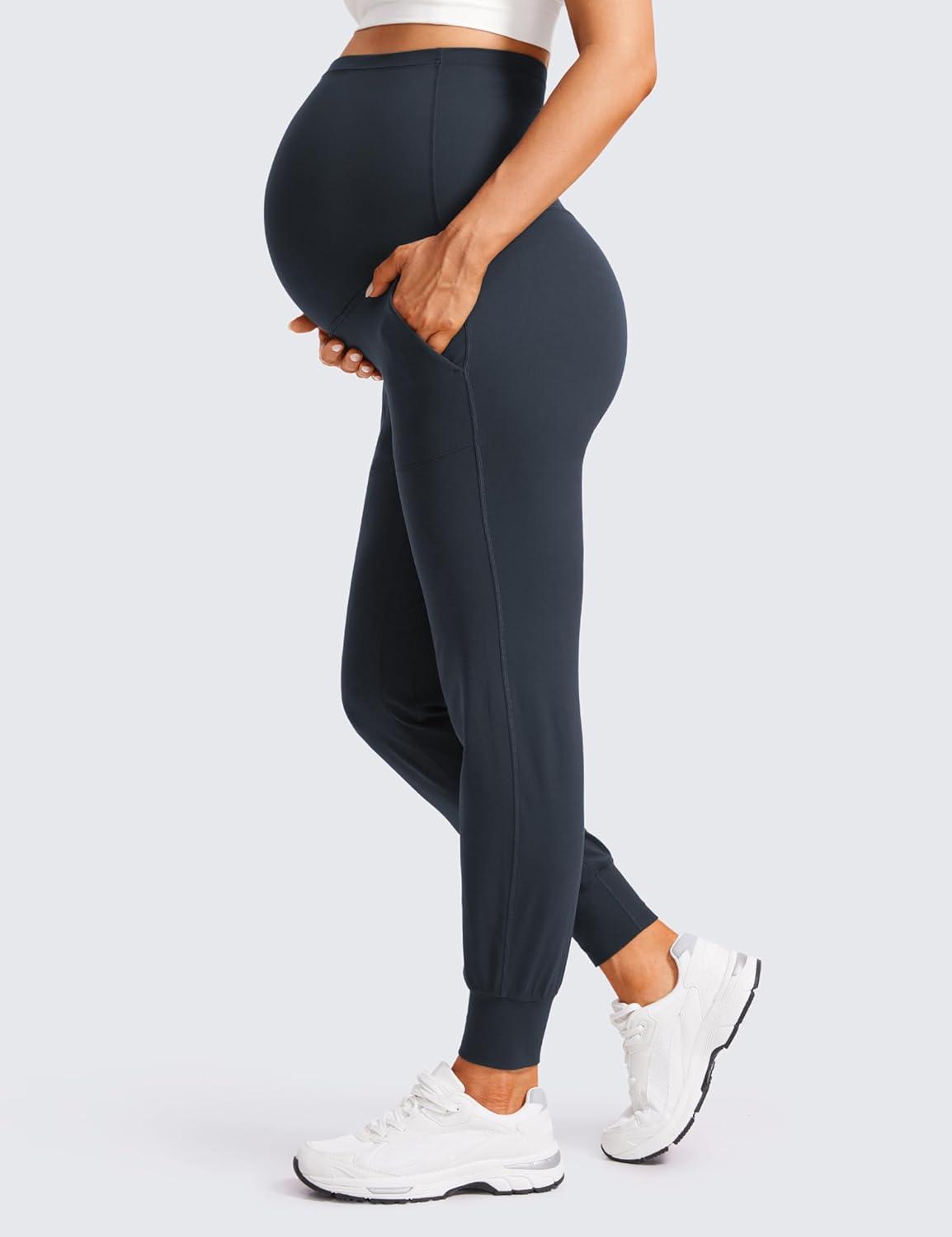 imageCRZ YOGA Butterluxe Maternity Joggers Pockets 27quot Workout Active Yoga Pregnancy Womens Pants Over The Belly SoftTrue Navy
