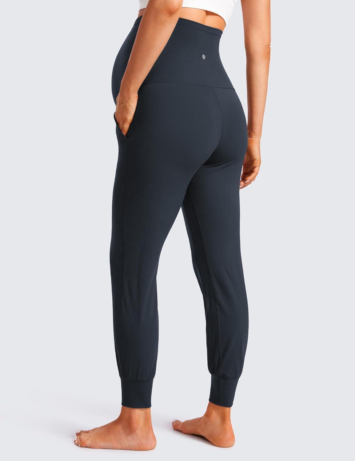 imageCRZ YOGA Butterluxe Maternity Joggers Pockets 27quot Workout Active Yoga Pregnancy Womens Pants Over The Belly SoftTrue Navy