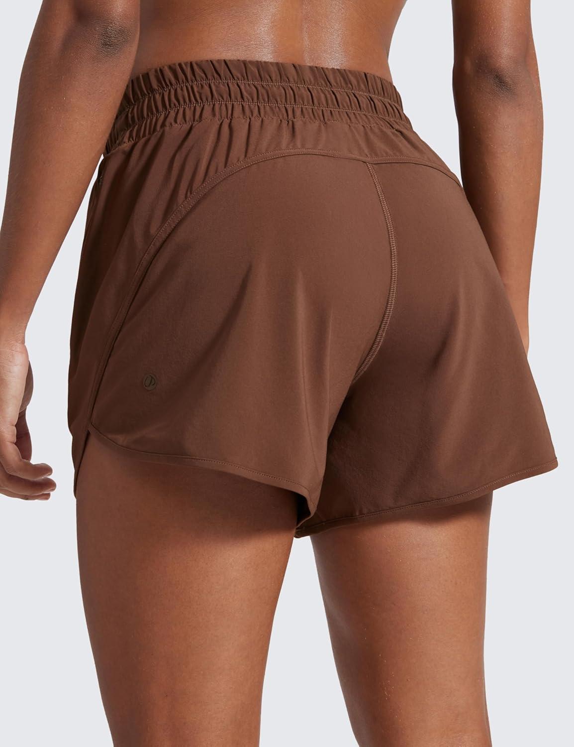 imageCRZ YOGA Dolphin Athletic Shorts for Women 5quot High Waisted Quick Dry for Running Workout Gym Track with Zip PocketCoffee Brown