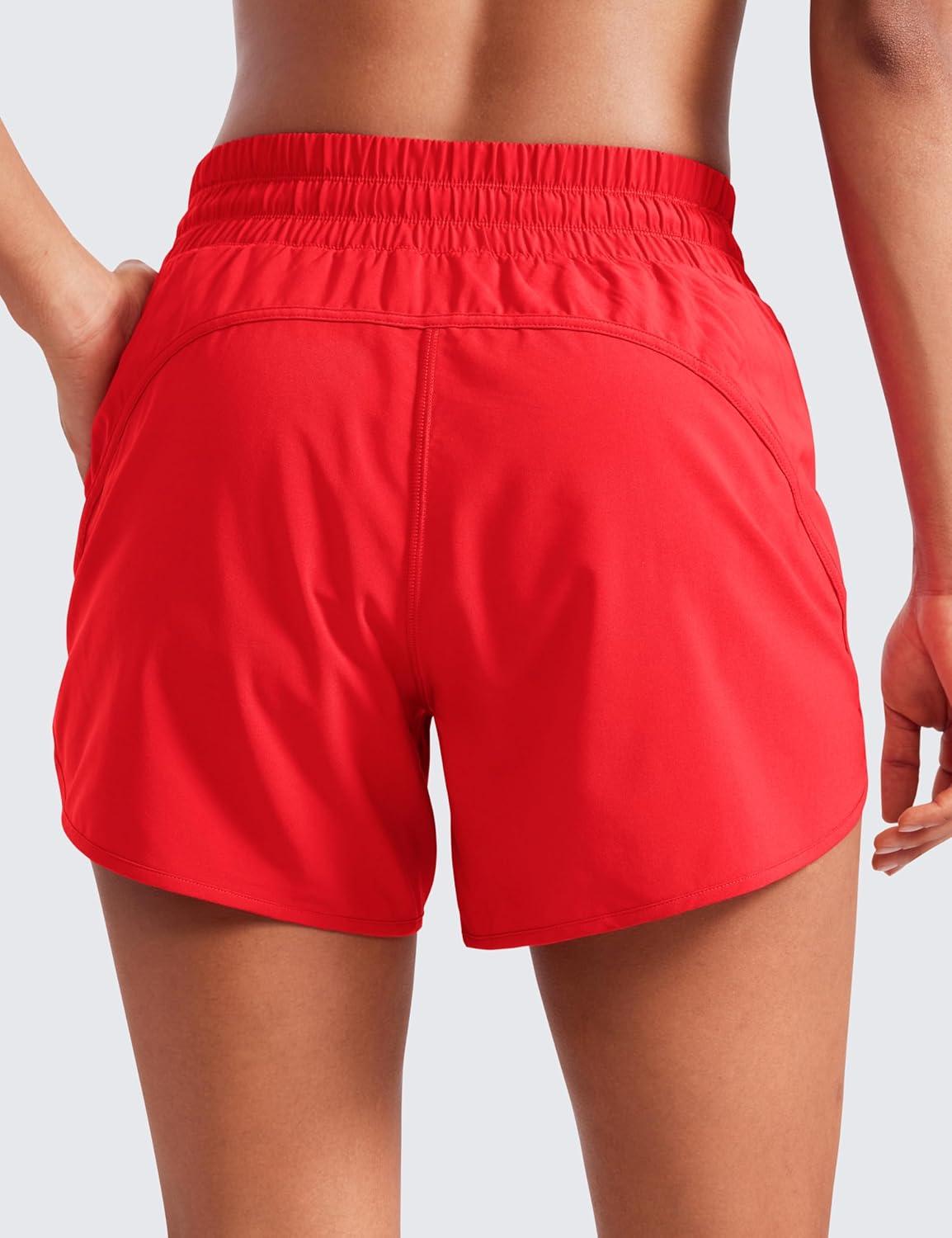 imageCRZ YOGA Dolphin Athletic Shorts for Women 5quot High Waisted Quick Dry for Running Workout Gym Track with Zip PocketDeep Red