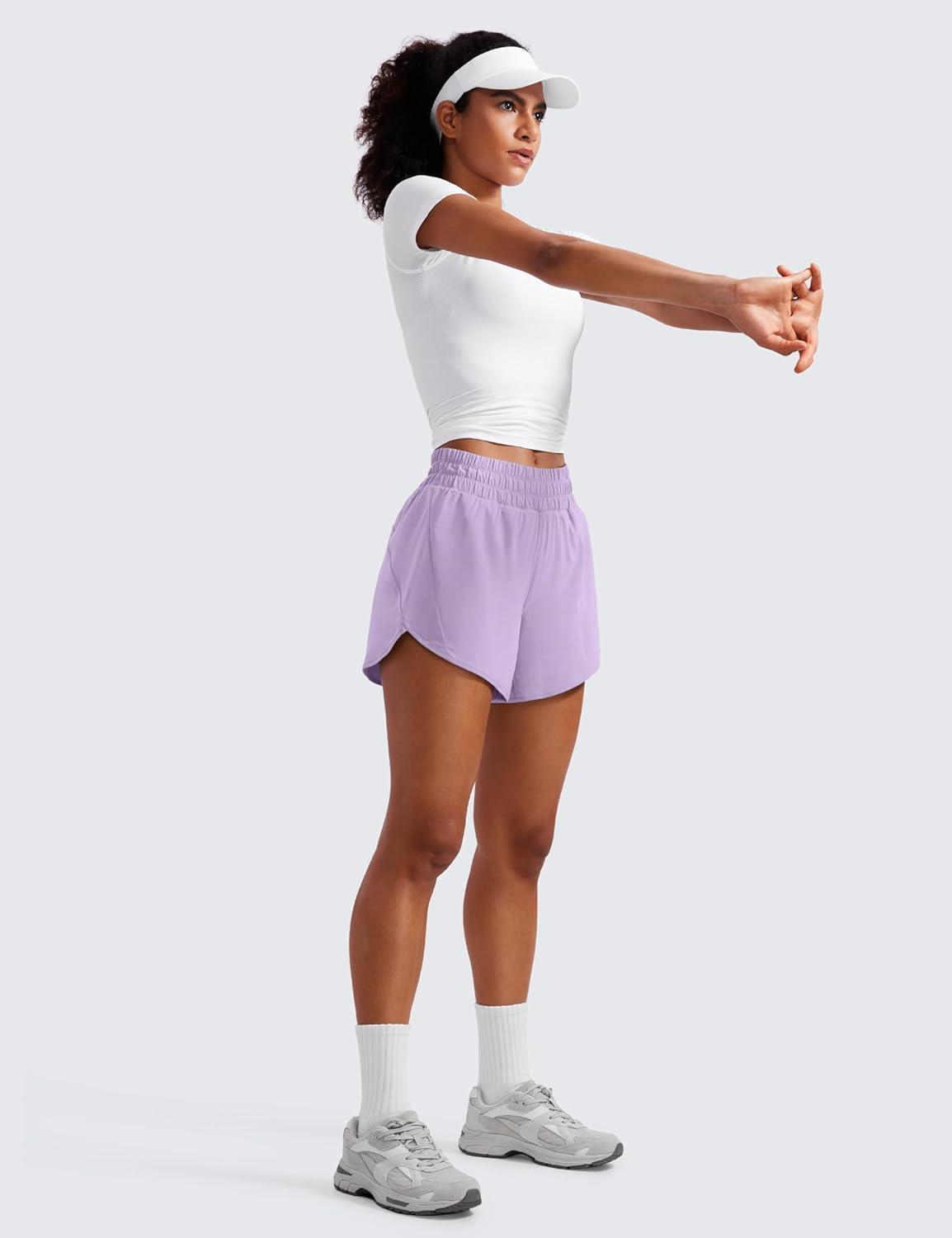 imageCRZ YOGA Dolphin Athletic Shorts for Women 5quot High Waisted Quick Dry for Running Workout Gym Track with Zip PocketLilac
