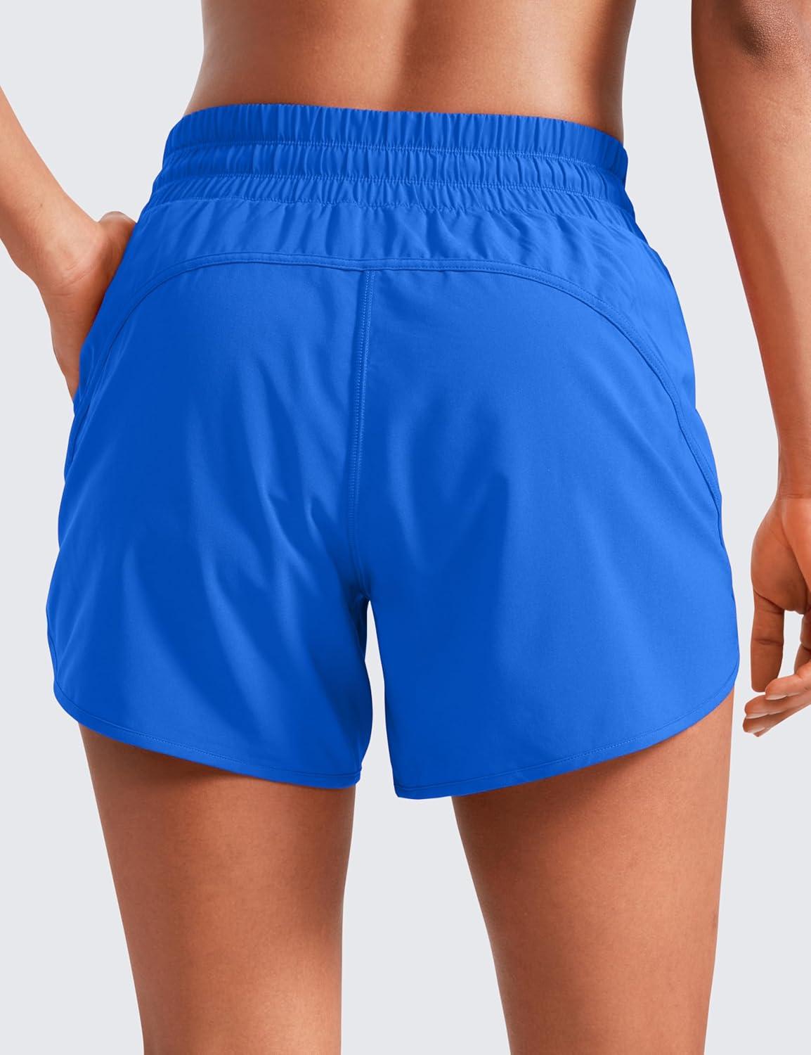 imageCRZ YOGA Dolphin Athletic Shorts for Women 5quot High Waisted Quick Dry for Running Workout Gym Track with Zip PocketSparkle Blue