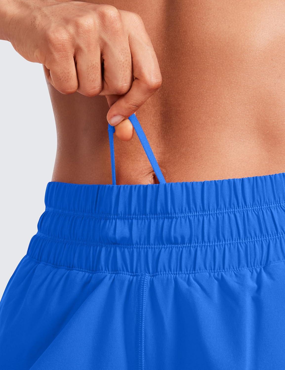 imageCRZ YOGA Dolphin Athletic Shorts for Women 5quot High Waisted Quick Dry for Running Workout Gym Track with Zip PocketSparkle Blue