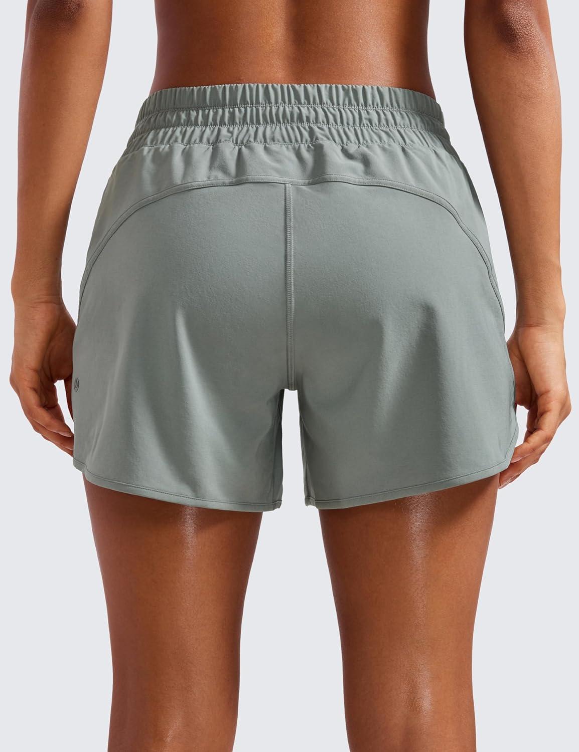 imageCRZ YOGA Dolphin Athletic Shorts for Women 5quot High Waisted Quick Dry for Running Workout Gym Track with Zip PocketSterling