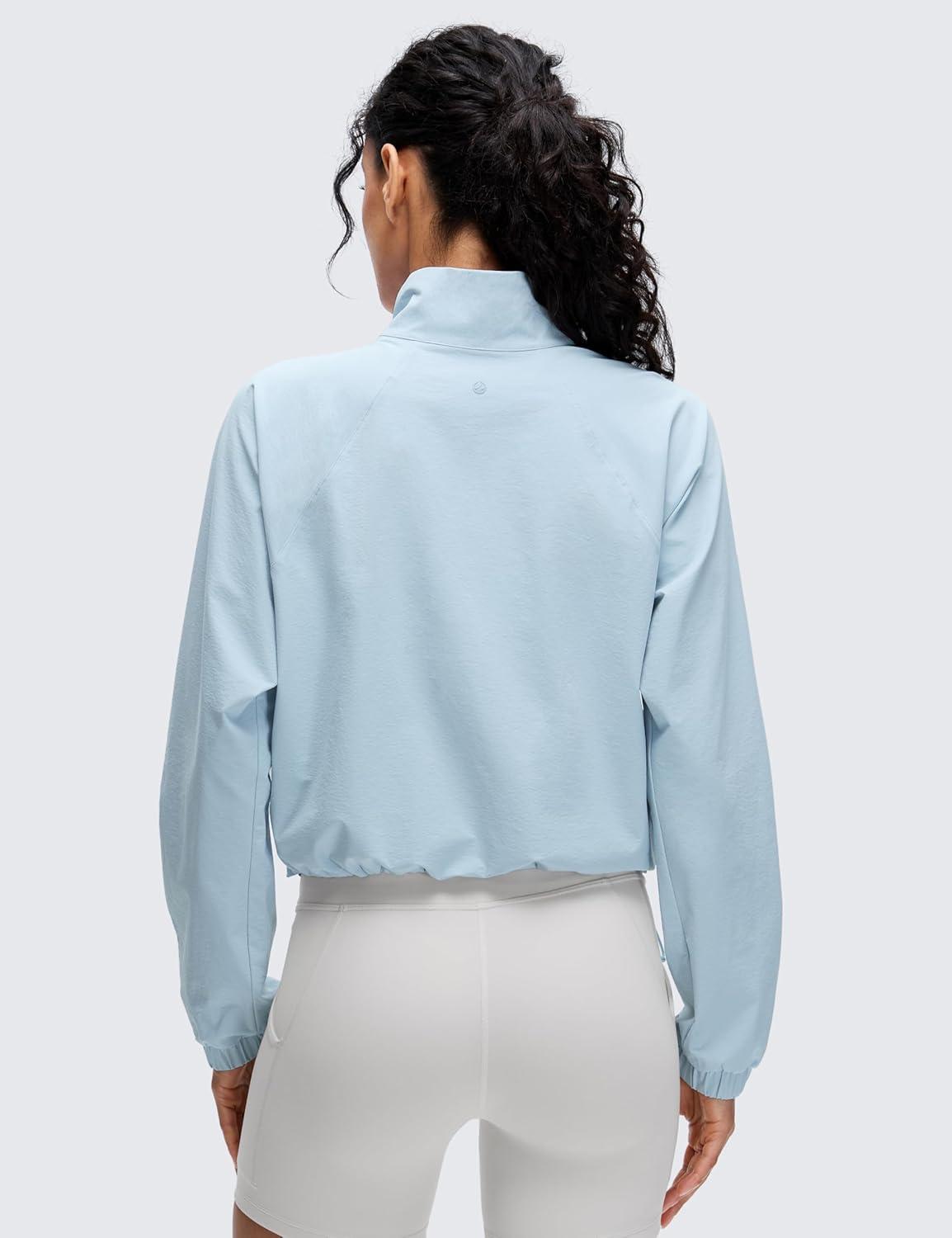 imageCRZ YOGA Drawstring Bottom Workout Jackets for Women Half Zip Pullover Cropped Workout Outdoor Tops with PocketsBlue Linen