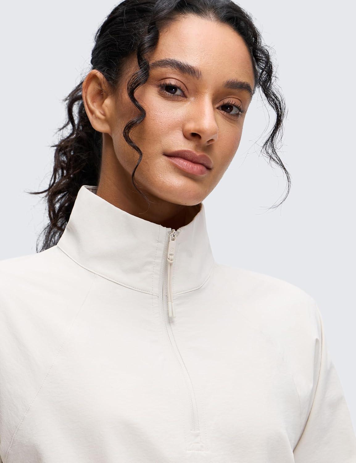 imageCRZ YOGA Drawstring Bottom Workout Jackets for Women Half Zip Pullover Cropped Workout Outdoor Tops with PocketsMilky White