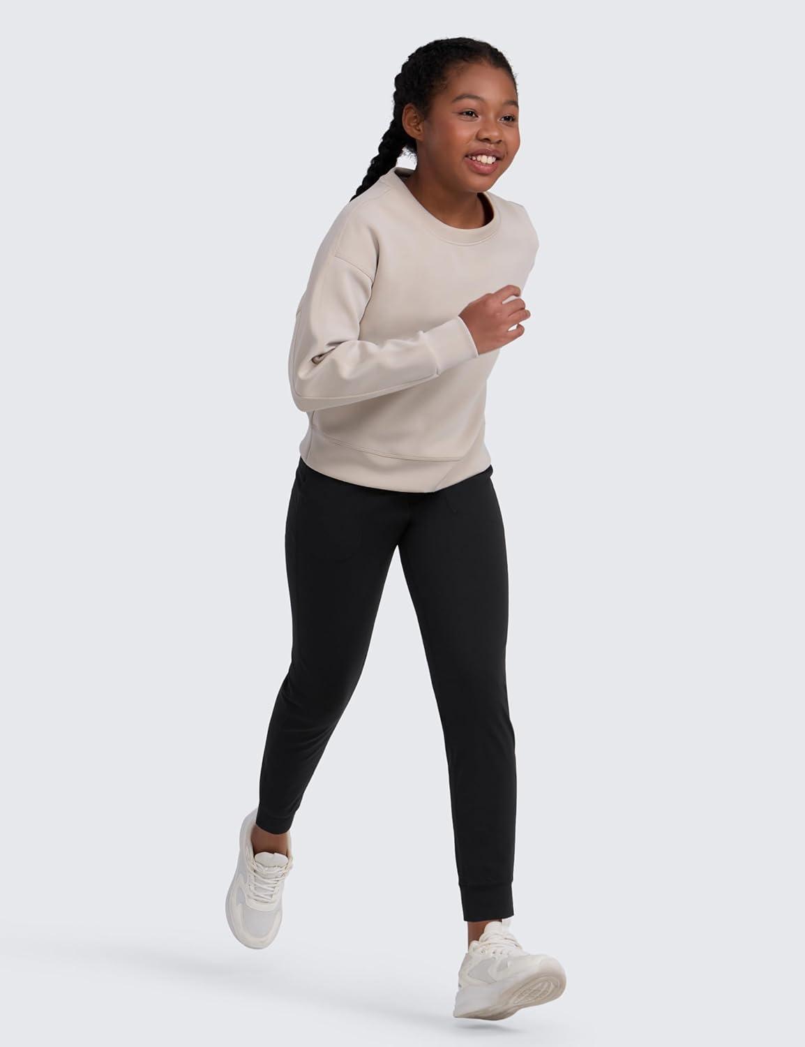 imageCRZ YOGA Girls Butterlift Athletic Joggers Active Running Casual Lounge High Waist Pants with Pockets Kid TeenBlack