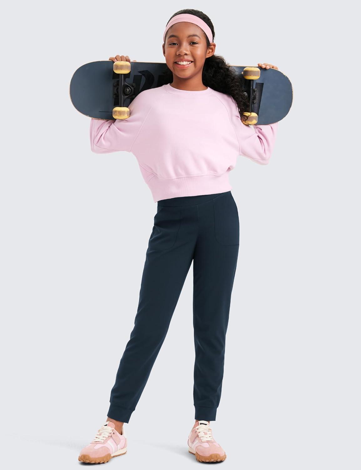 imageCRZ YOGA Girls Butterlift Athletic Joggers Active Running Casual Lounge High Waist Pants with Pockets Kid TeenTwilight Blue