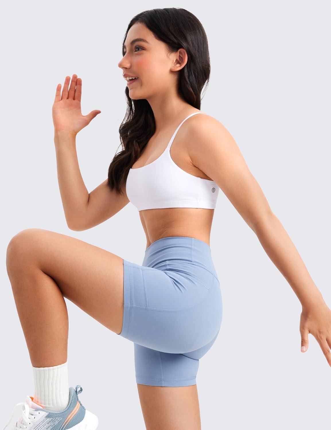 imageCRZ YOGA Girls Butterluxe Adjustable Spaghetti Strap Sports Bra Yoga Athletic Casual Scoop Neck Crop Padded Kids TeenWhite