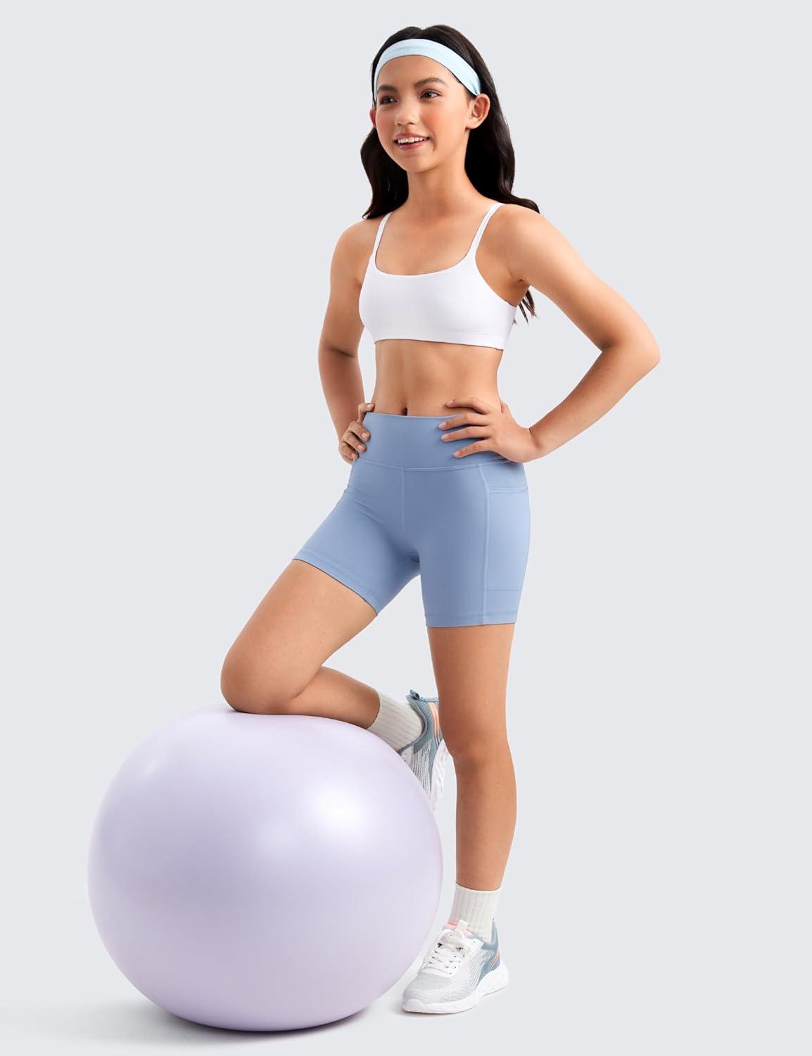 imageCRZ YOGA Girls Butterluxe Adjustable Spaghetti Strap Sports Bra Yoga Athletic Casual Scoop Neck Crop Padded Kids TeenWhite