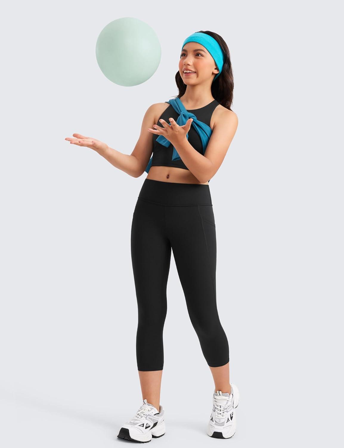 imageCRZ YOGA Girls Butterluxe Yoga Capri Leggings with Pockets Athletic Sports Casual Pants High Waist Tights Kids TeenBlack