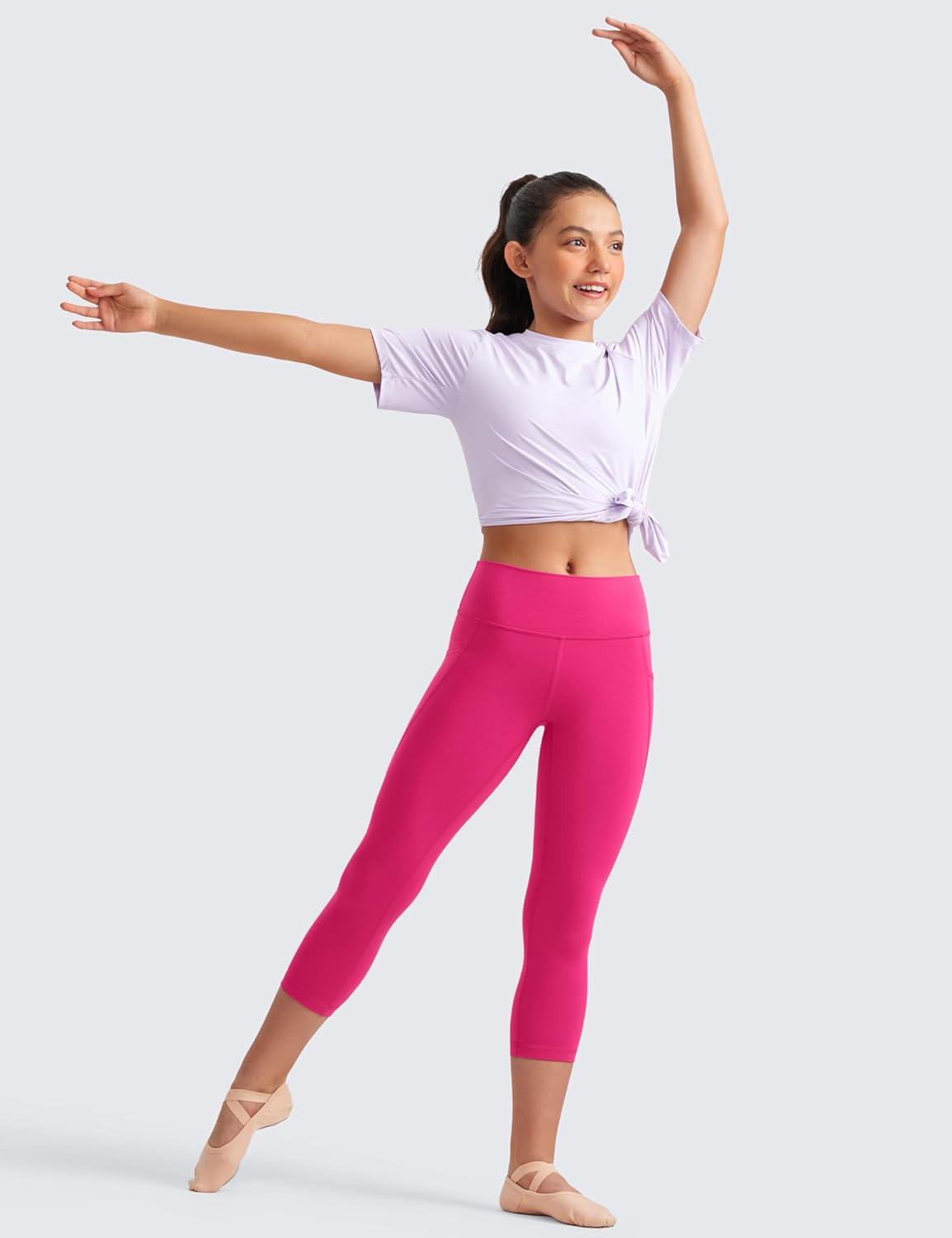 imageCRZ YOGA Girls Butterluxe Yoga Capri Leggings with Pockets Athletic Sports Casual Pants High Waist Tights Kids TeenGranita Pink