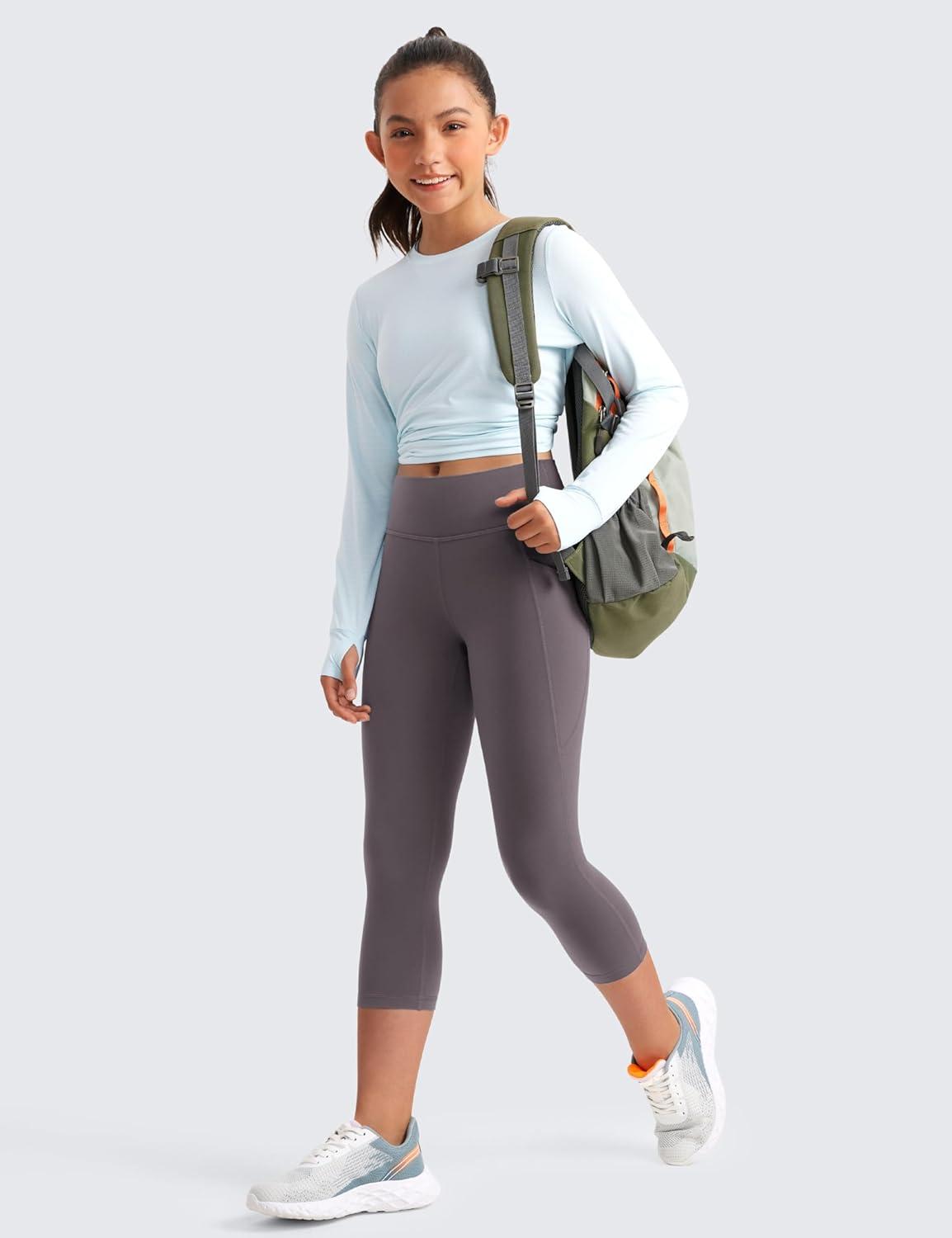 imageCRZ YOGA Girls Butterluxe Yoga Capri Leggings with Pockets Athletic Sports Casual Pants High Waist Tights Kids TeenTornado Grey