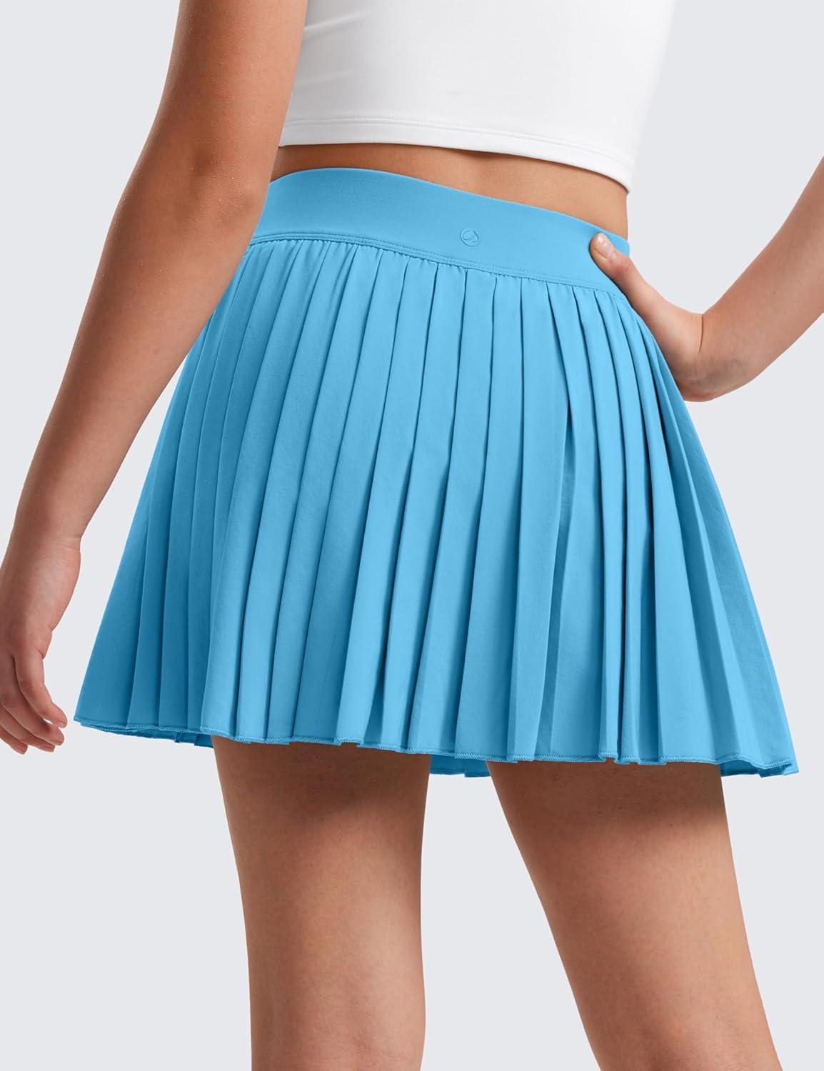 imageCRZ YOGA Girls FeatheryFit Soft Athletic Pleated Skirts Tennis School Casual Skorts with Pockets Liner Kids TeenKayak Blue