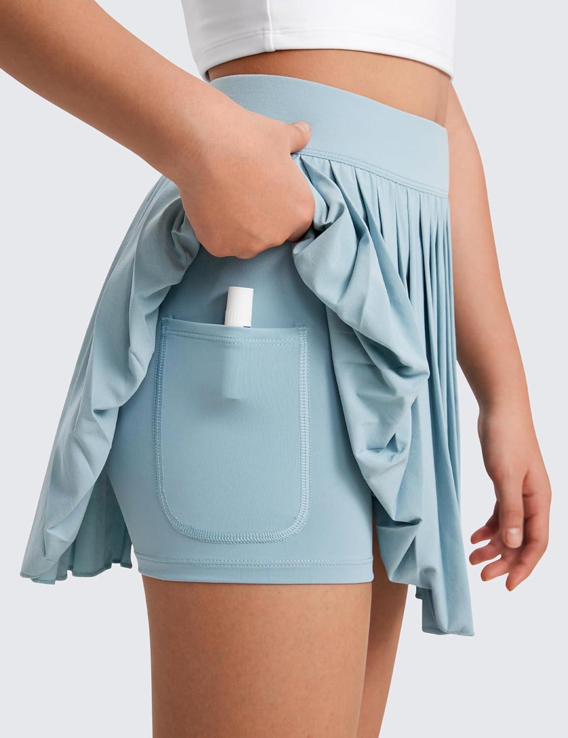 imageCRZ YOGA Girls FeatheryFit Soft Athletic Pleated Skirts Tennis School Casual Skorts with Pockets Liner Kids TeenLight Grayish Blue