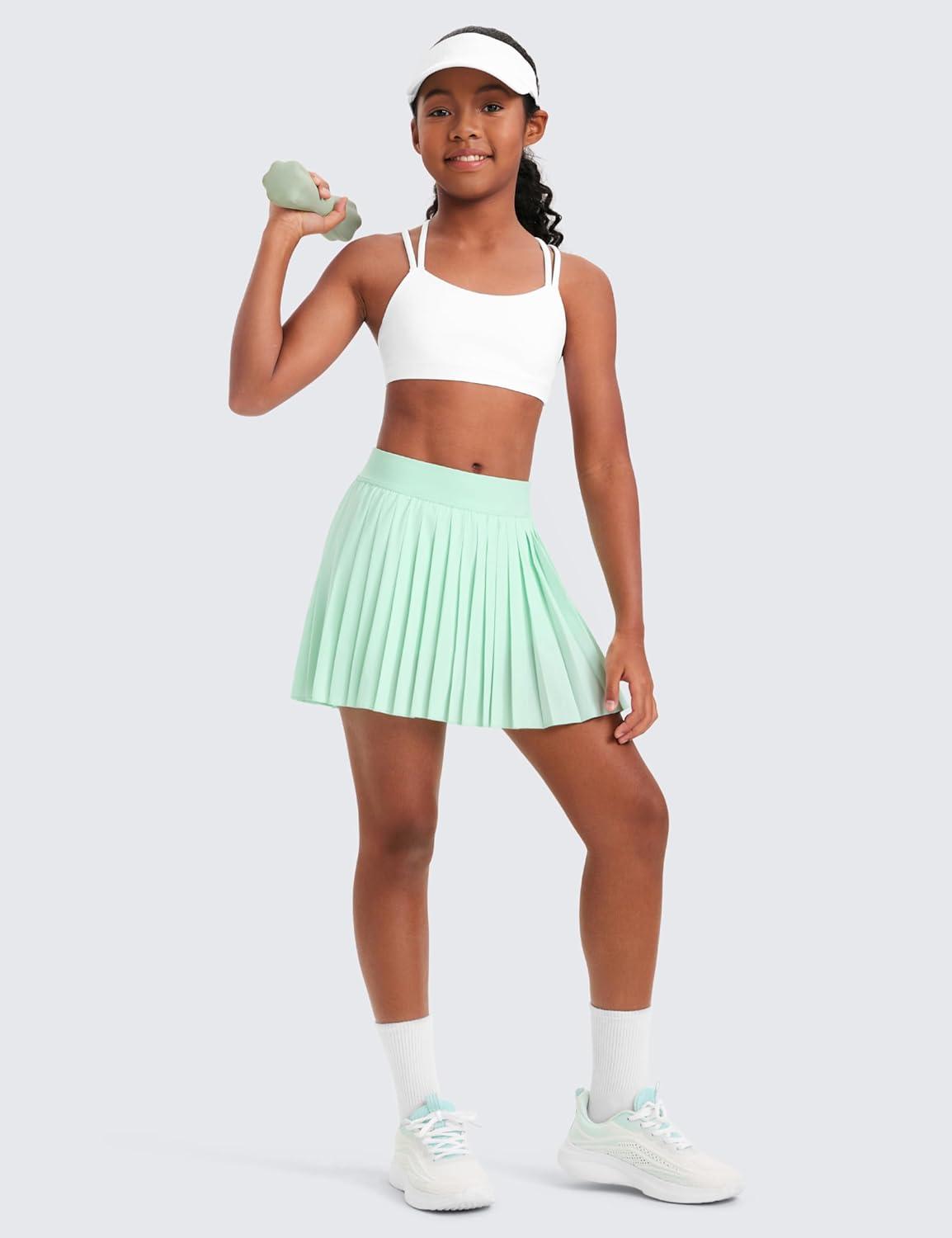 imageCRZ YOGA Girls FeatheryFit Soft Athletic Pleated Skirts Tennis School Casual Skorts with Pockets Liner Kids TeenMint Moment