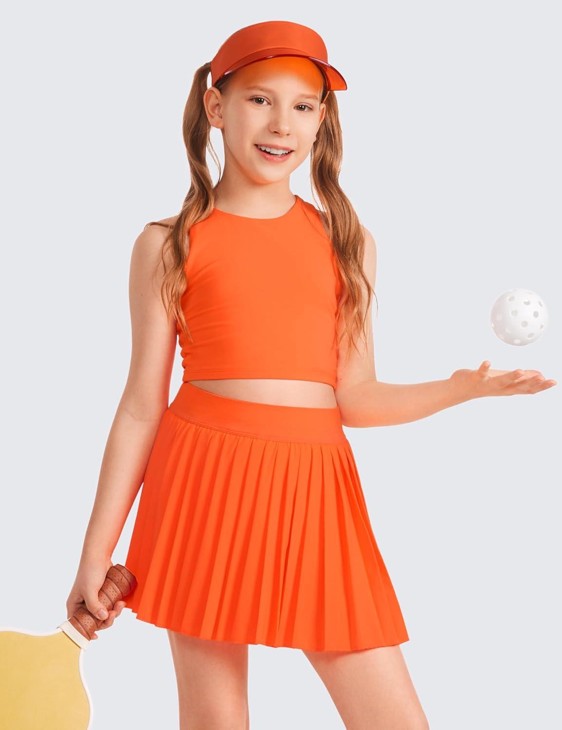 imageCRZ YOGA Girls FeatheryFit Soft Athletic Pleated Skirts Tennis School Casual Skorts with Pockets Liner Kids TeenNeon Orange