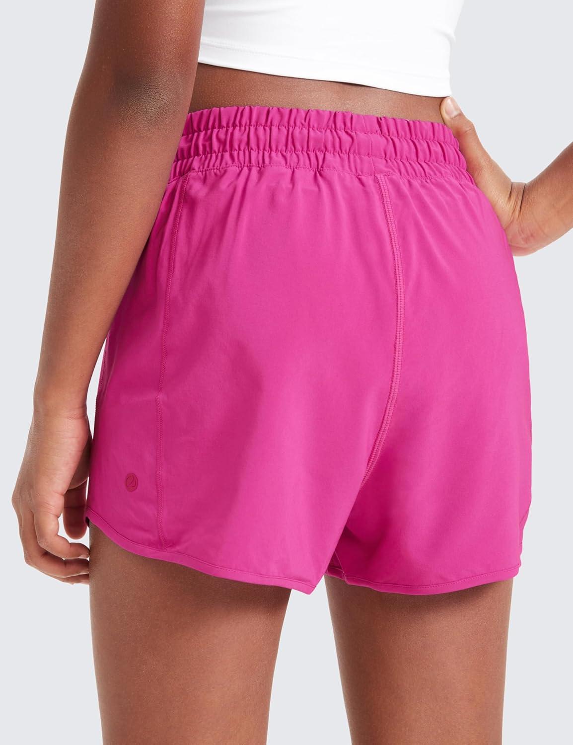 imageCRZ YOGA Girls FeatheryFit Soft Athletic Shorts with Zipper Pocket Tennis Soccer Running Casual Liner Kids TeenHibiscus Purple