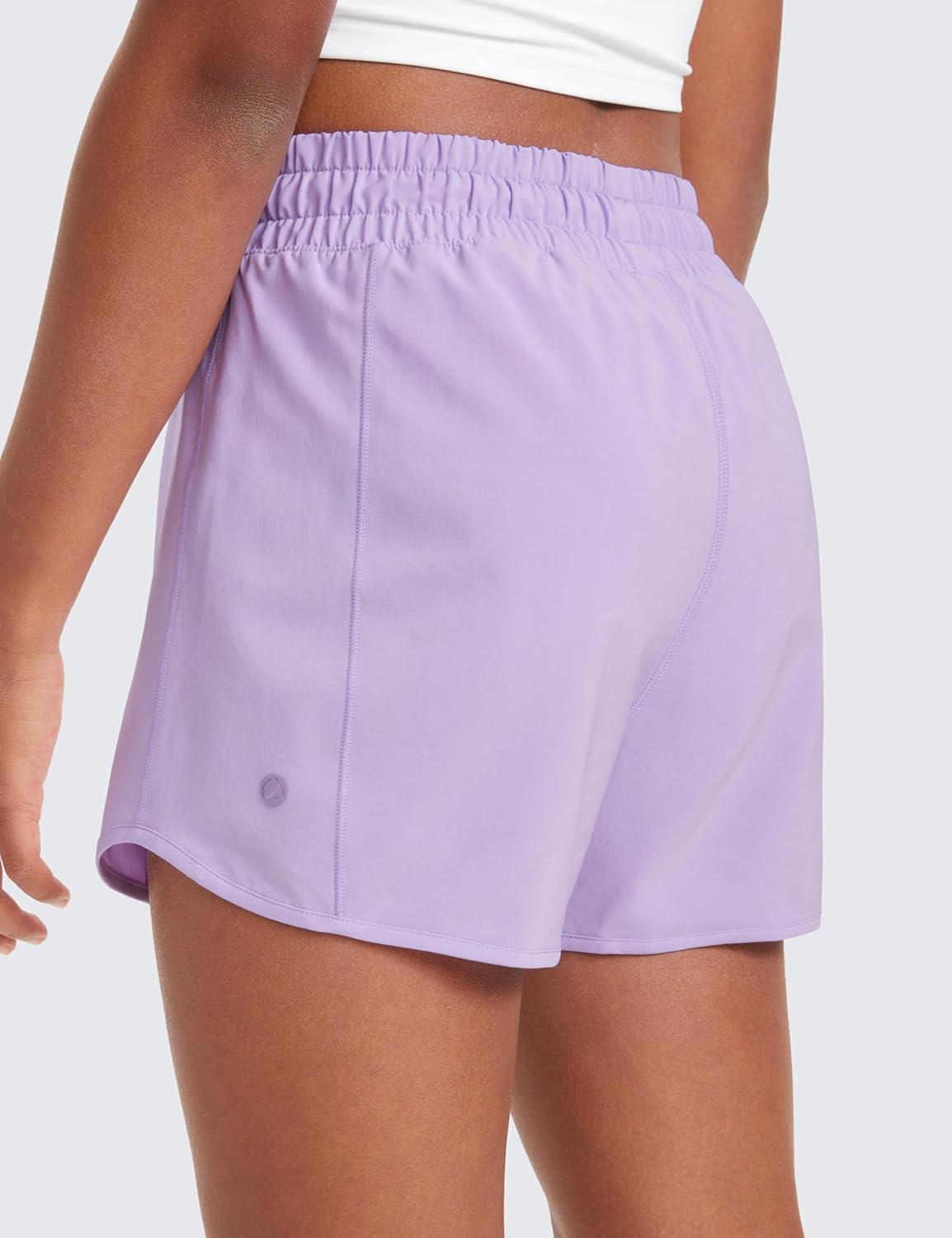 imageCRZ YOGA Girls FeatheryFit Soft Athletic Shorts with Zipper Pocket Tennis Soccer Running Casual Liner Kids TeenLilac