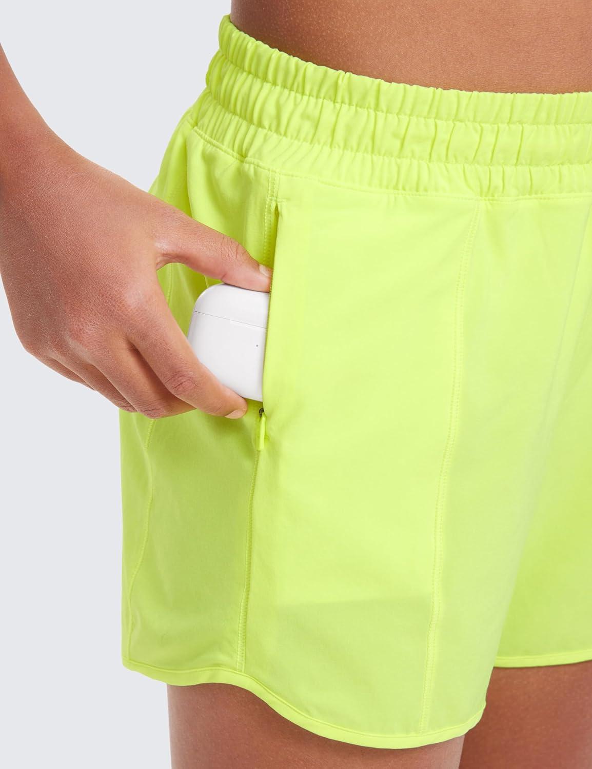 imageCRZ YOGA Girls FeatheryFit Soft Athletic Shorts with Zipper Pocket Tennis Soccer Running Casual Liner Kids TeenNeon Yellow