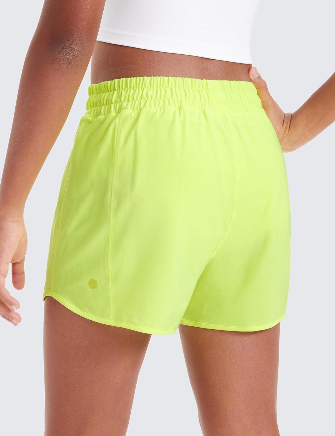 imageCRZ YOGA Girls FeatheryFit Soft Athletic Shorts with Zipper Pocket Tennis Soccer Running Casual Liner Kids TeenNeon Yellow