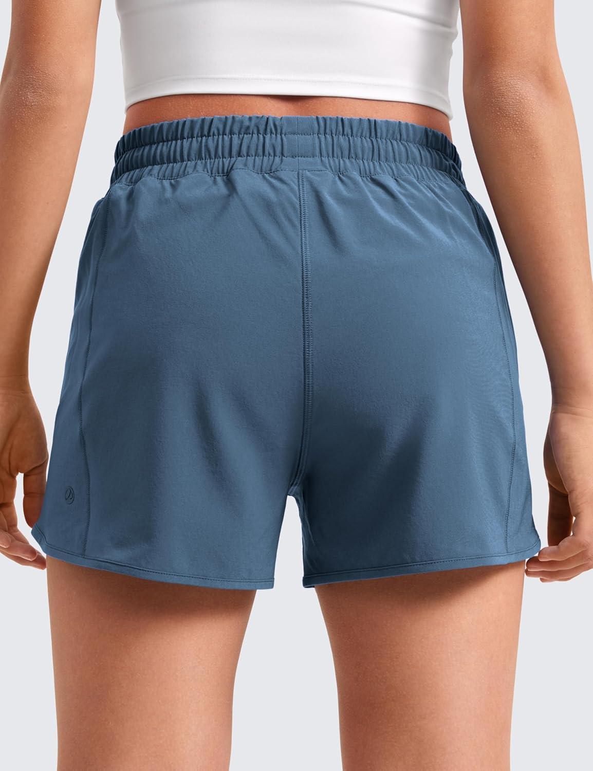 imageCRZ YOGA Girls FeatheryFit Soft Athletic Shorts with Zipper Pocket Tennis Soccer Running Casual Liner Kids TeenStelindigo