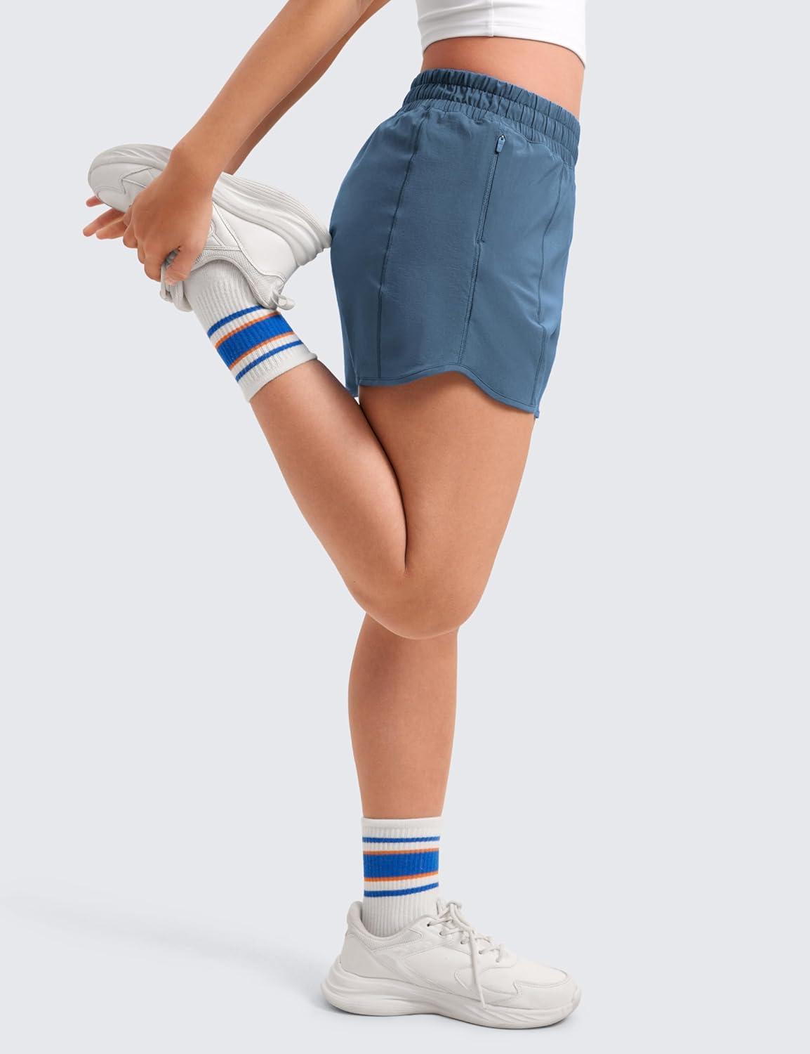 imageCRZ YOGA Girls FeatheryFit Soft Athletic Shorts with Zipper Pocket Tennis Soccer Running Casual Liner Kids TeenStelindigo