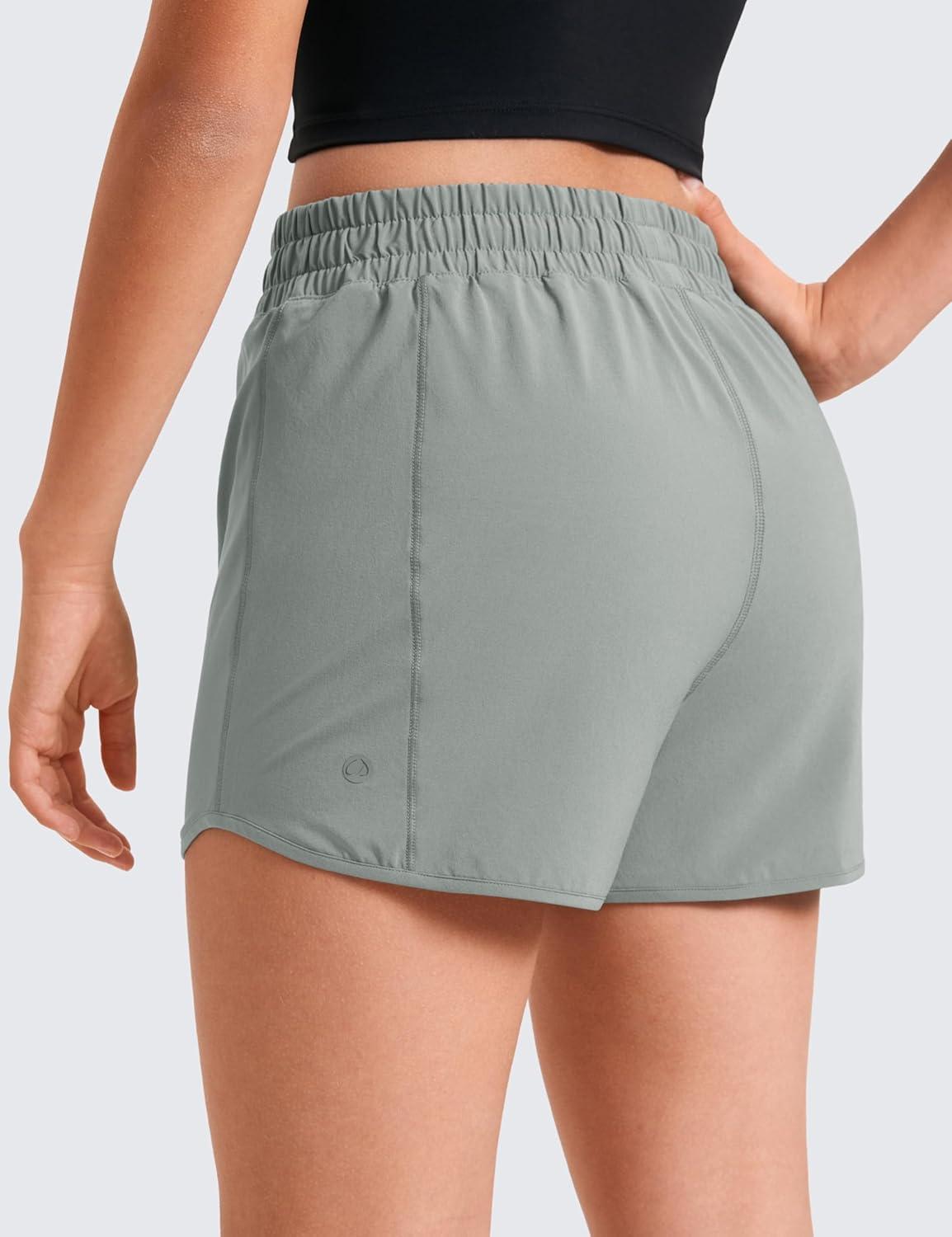 imageCRZ YOGA Girls FeatheryFit Soft Athletic Shorts with Zipper Pocket Tennis Soccer Running Casual Liner Kids TeenSterling