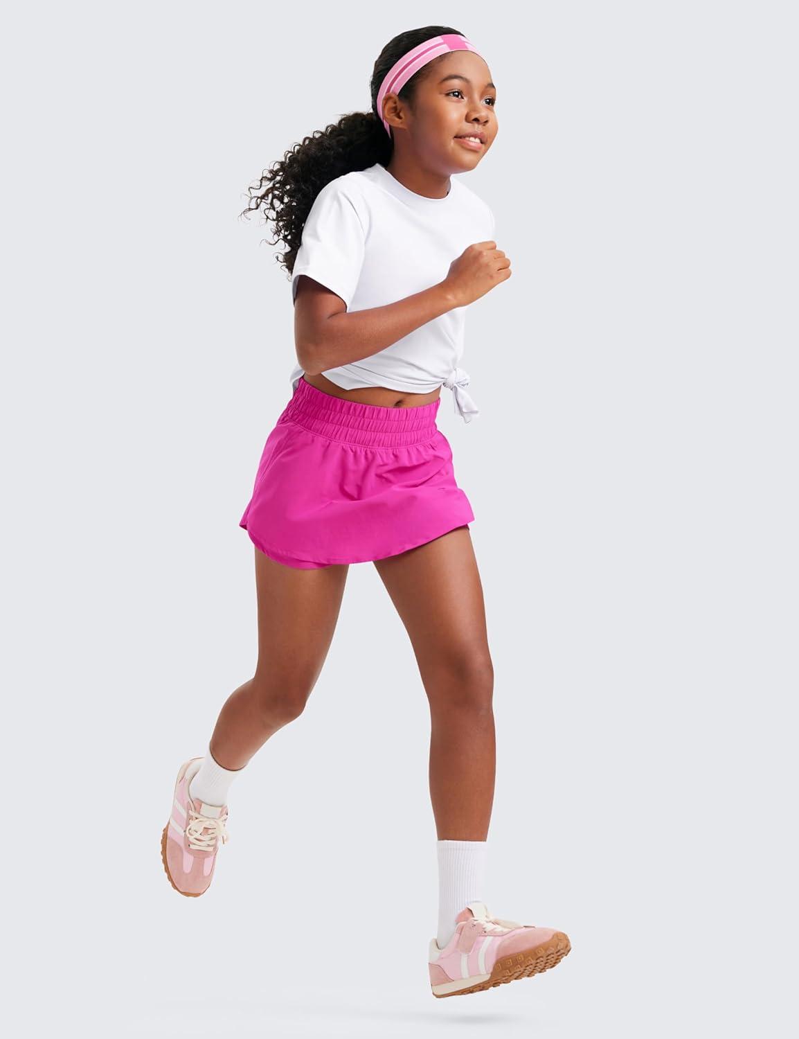 imageCRZ YOGA Girls FeatheryFit Soft Flowy Athletic Shorts Tennis Soccer Casual Ruffle Skirt Zip Pocket Liner Kids TeenHibiscus Purple