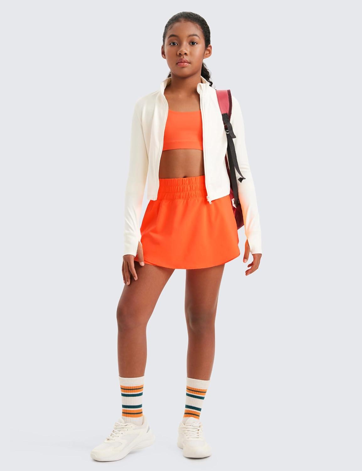 imageCRZ YOGA Girls FeatheryFit Soft Flowy Athletic Shorts Tennis Soccer Casual Ruffle Skirt Zip Pocket Liner Kids TeenNeon Orange