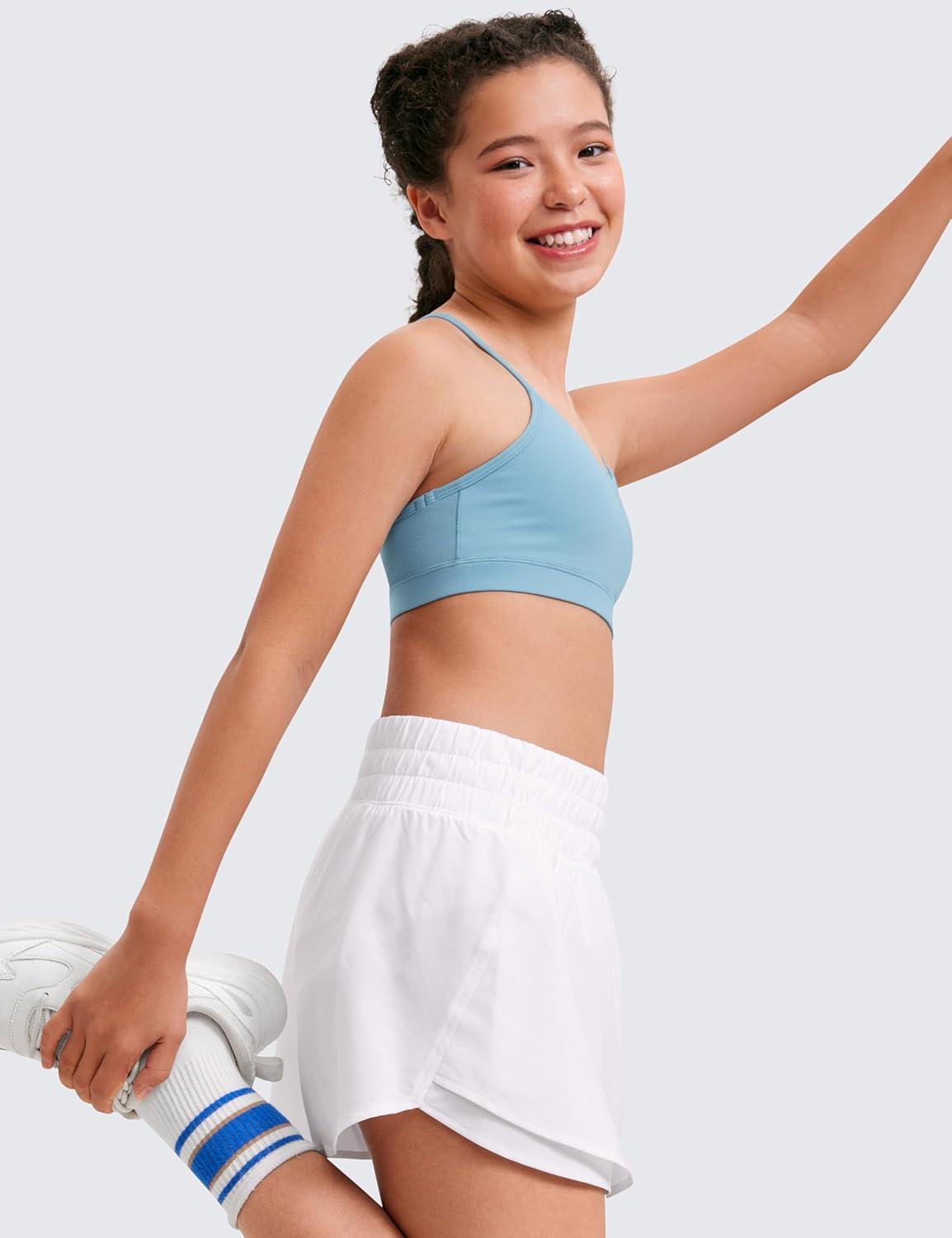 imageCRZ YOGA Girls FeatheryFit Soft Flowy Athletic Shorts Tennis Soccer Casual Ruffle Skirt Zip Pocket Liner Kids TeenWhite