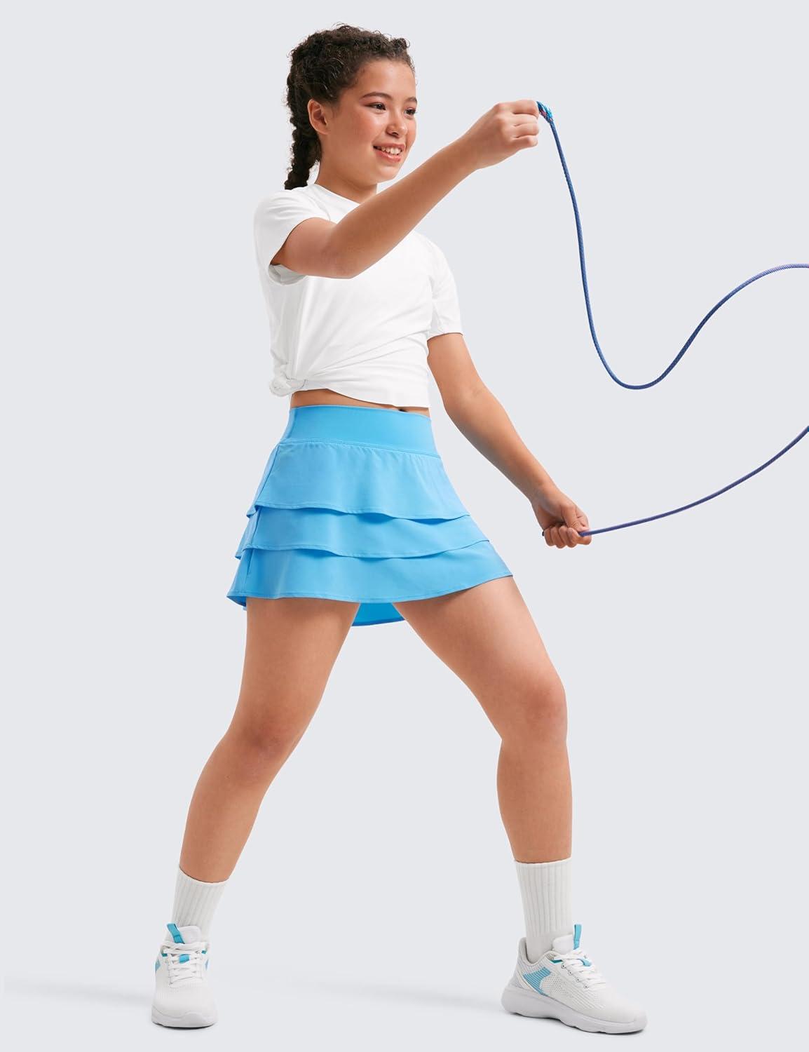 imageCRZ YOGA Girls FeatheryFit Soft Ruffle Athletic Skirts Tennis School Casual Skorts with Pockets Liner Kids TeenKayak Blue