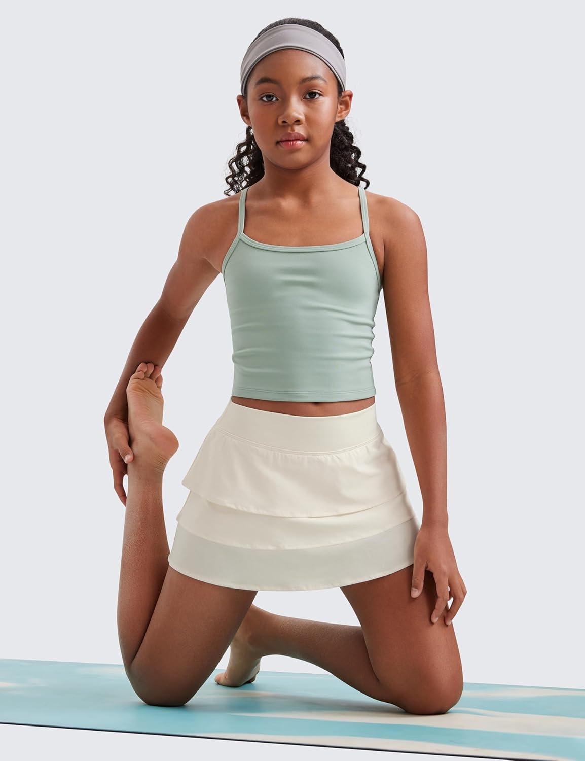 imageCRZ YOGA Girls FeatheryFit Soft Ruffle Athletic Skirts Tennis School Casual Skorts with Pockets Liner Kids TeenWhite Apricot