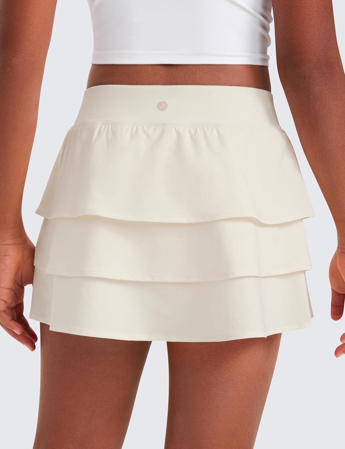 imageCRZ YOGA Girls FeatheryFit Soft Ruffle Athletic Skirts Tennis School Casual Skorts with Pockets Liner Kids TeenWhite Apricot