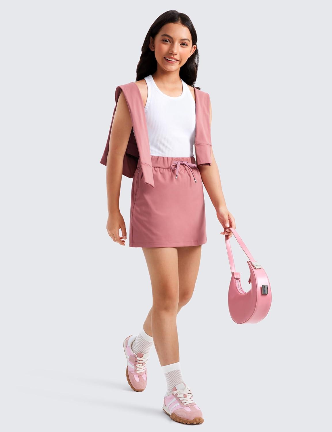 imageCRZ YOGA Girls Seamless Ribbed Longline Sports Bra Yoga Athletic Casual Tops High Neck Racerback Padded Kids TeenWhite