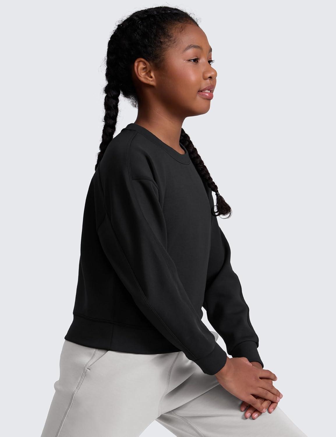 imageCRZ YOGA Girls SoftAura Long Sleeve Crew Neck Casual Hoodie Lounge Pullover Sweatshirts Relaxed Waist Length Kids TeenBlack