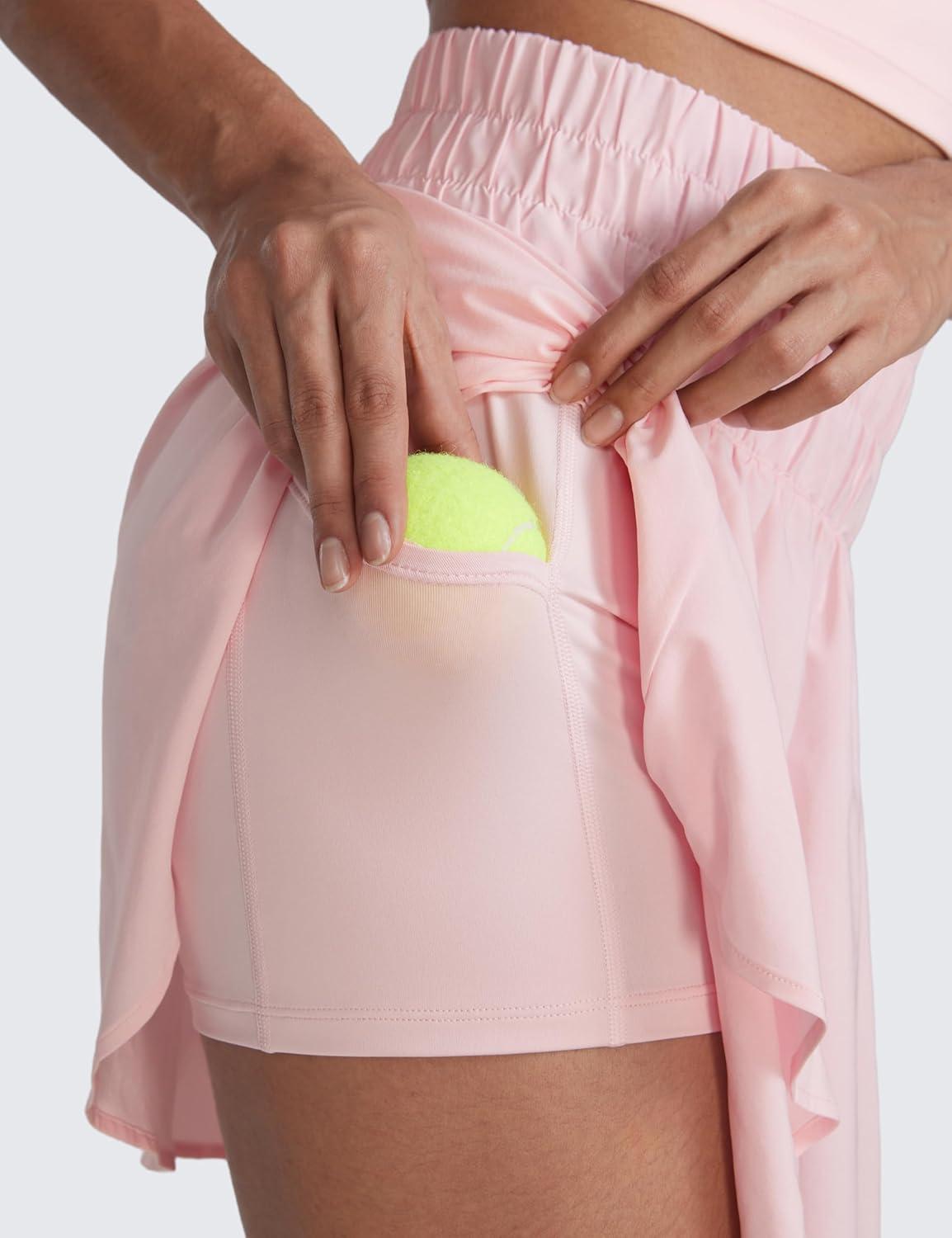imageCRZ YOGA High ShirredWaisted Tennis Skirts for Women Mini Lined Golf Casual Athletic Flowy Skorts with PocketsStrawberry Pink