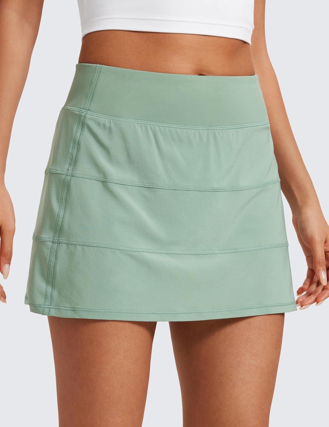 imageCRZ YOGA High Waisted A line Golf Skirts for Women Mini Lined Tennis Casual Work Skorts with 3 PocketsGreen Palm Court