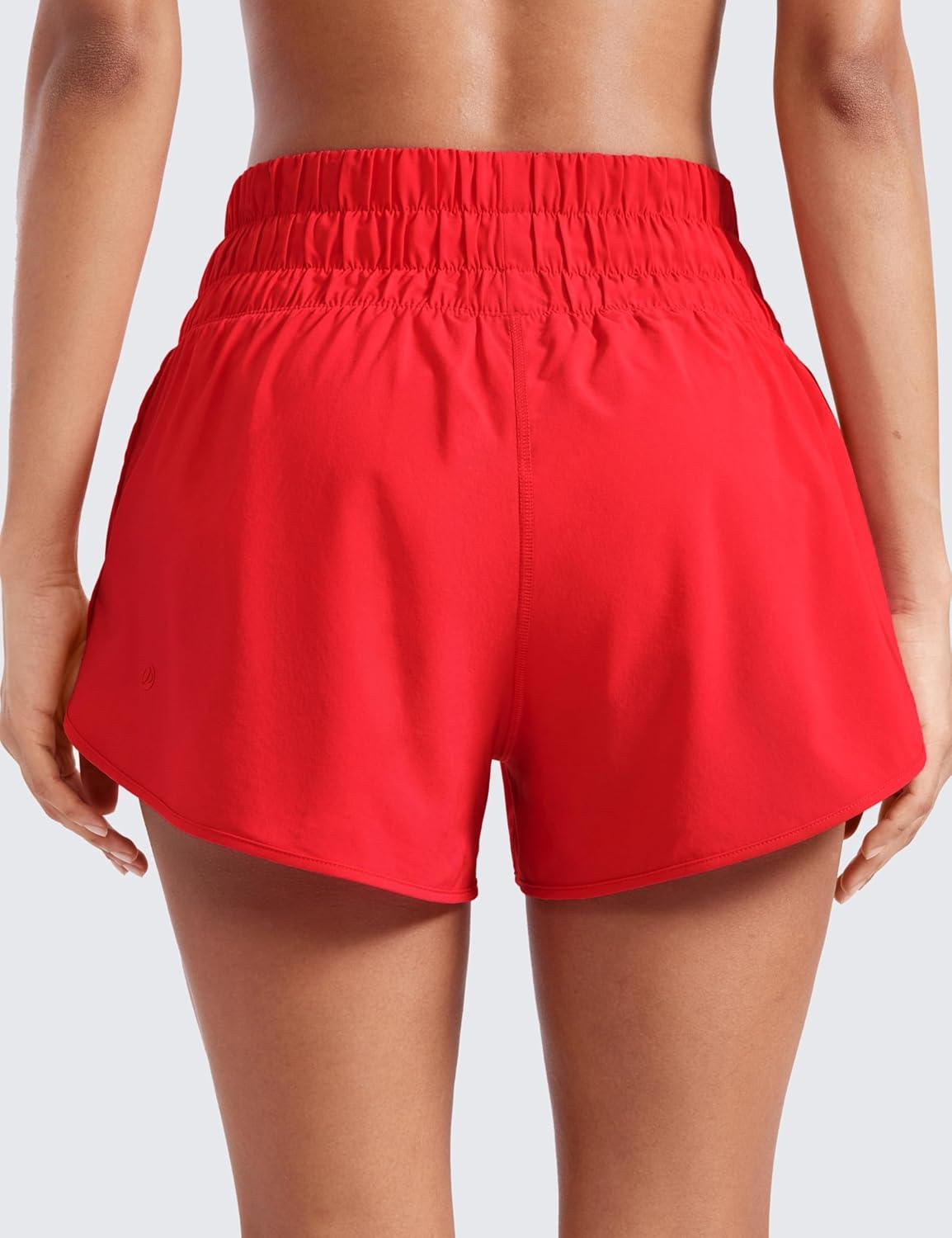 imageCRZ YOGA High Waisted Dolphin Running Shorts for Womens Mesh Liner for Gym Workout Athletic with Zipper PocketDeep Red