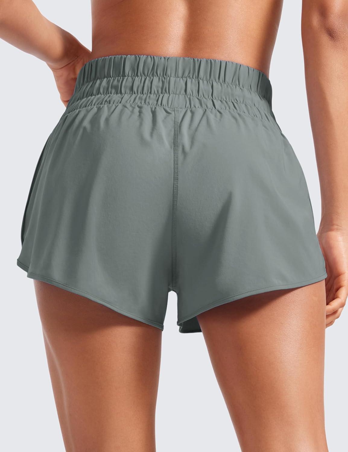imageCRZ YOGA High Waisted Dolphin Running Shorts for Womens Mesh Liner for Gym Workout Athletic with Zipper PocketGrey Sage