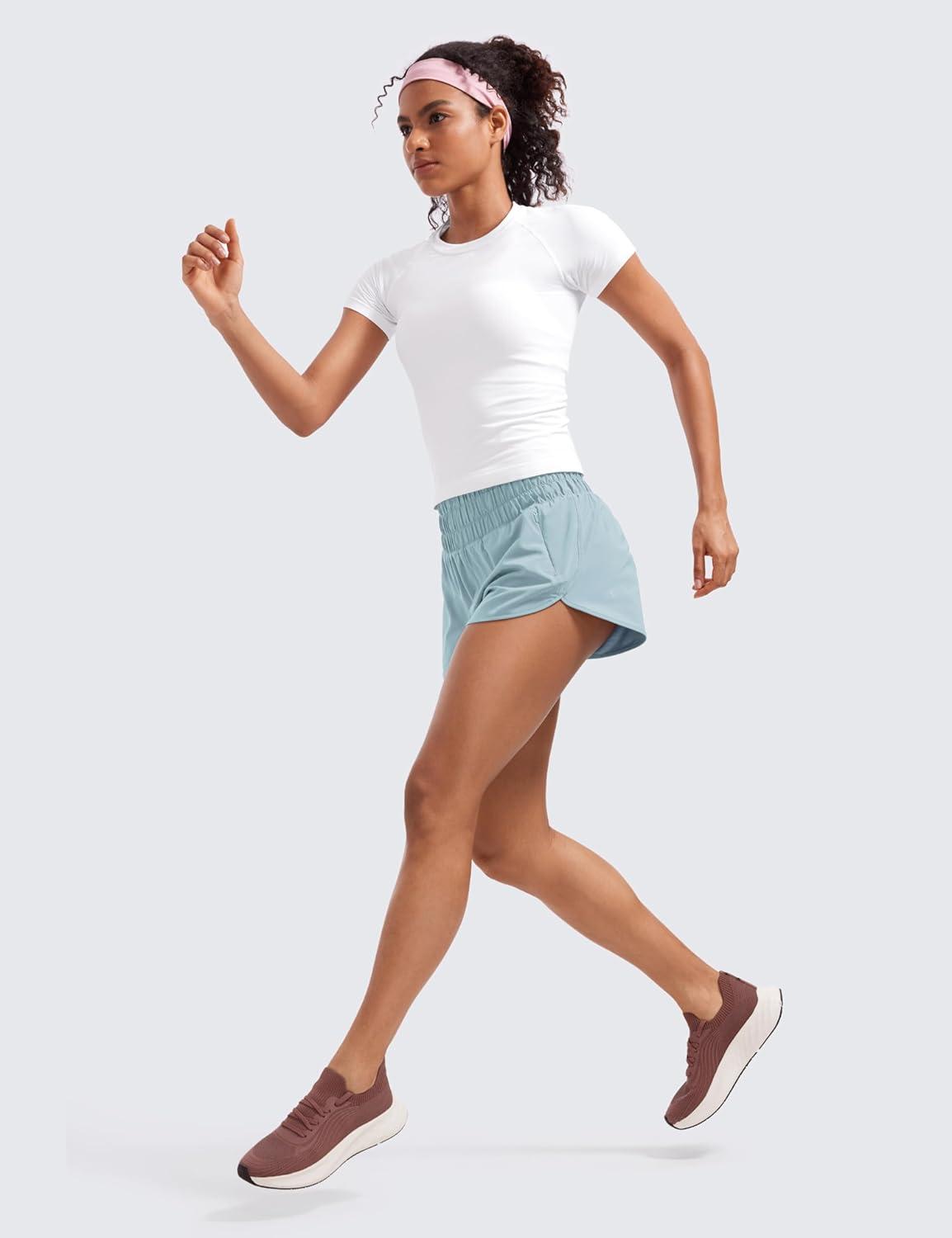 imageCRZ YOGA High Waisted Dolphin Running Shorts for Womens Mesh Liner for Gym Workout Athletic with Zipper PocketLight Grayish Blue