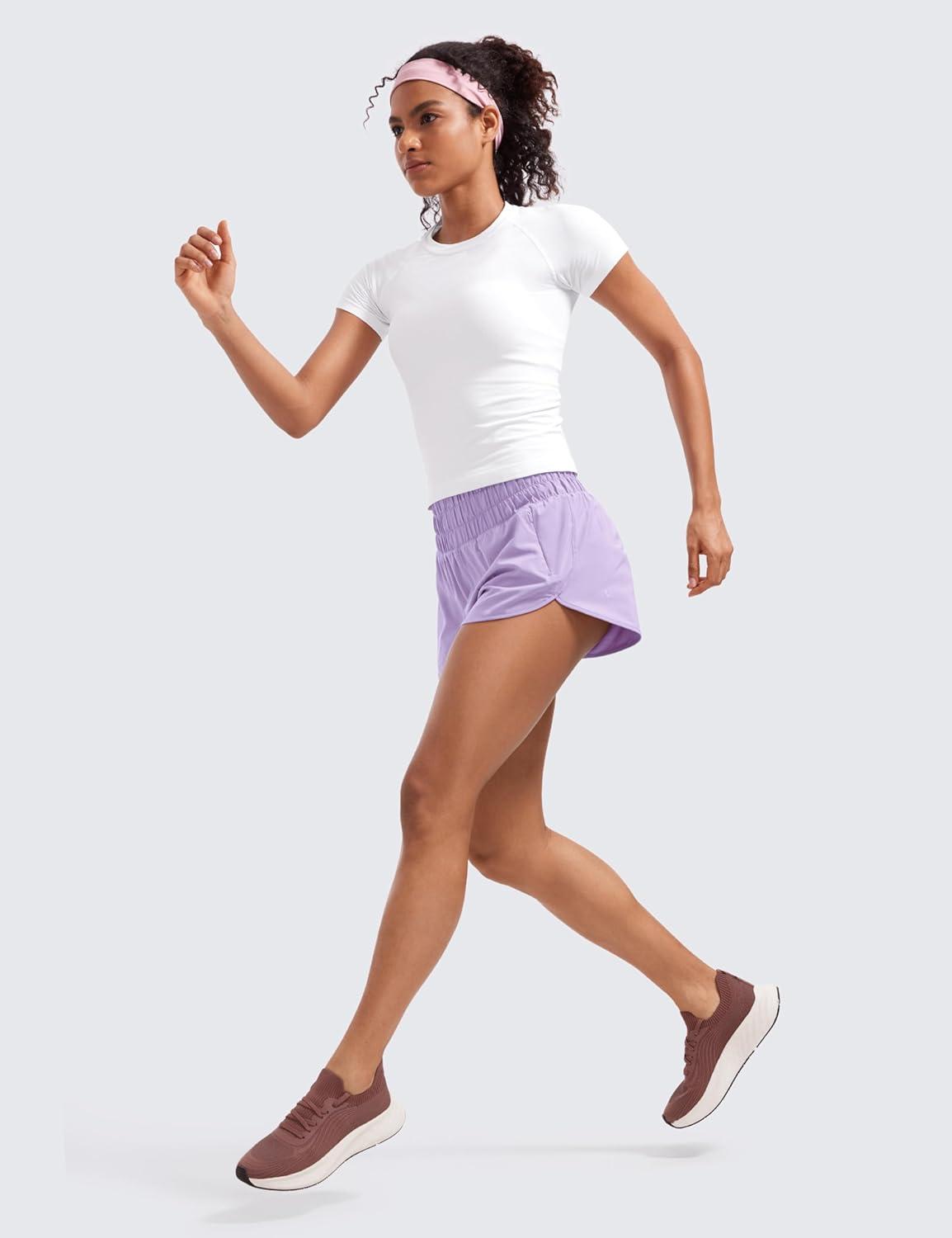 imageCRZ YOGA High Waisted Dolphin Running Shorts for Womens Mesh Liner for Gym Workout Athletic with Zipper PocketLilac