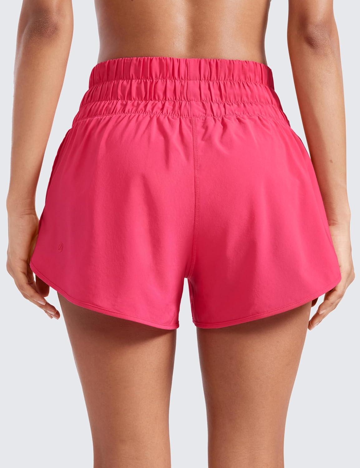 imageCRZ YOGA High Waisted Dolphin Running Shorts for Womens Mesh Liner for Gym Workout Athletic with Zipper PocketLip Gloss Pink